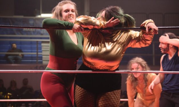 A women’s pro wrestling troupe in Fairbanks rings in 10 years of bodyslams and bruises